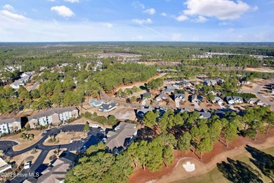 This Champions condo in the vibrant golf community of Sea Trail on Sea Trail Golf Resort in North Carolina - for sale on GolfHomes.com, golf home, golf lot