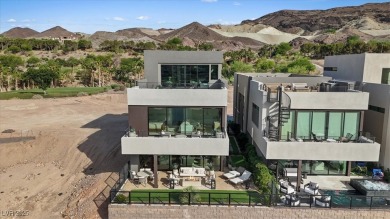Far surpassing any model home, this extraordinary residence on South Shore At Lake Las Vegas in Nevada - for sale on GolfHomes.com, golf home, golf lot