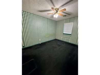Welcome to this well-maintained, one-owner home offering three on Silverhorn Golf Club in Oklahoma - for sale on GolfHomes.com, golf home, golf lot