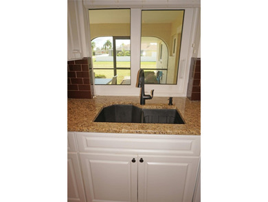 Impressive 3 Bedroom, 2 Bathroom home with attached 2 Car Garage on Deep Creek Golf Club in Florida - for sale on GolfHomes.com, golf home, golf lot