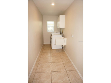 Impressive 3 Bedroom, 2 Bathroom home with attached 2 Car Garage on Deep Creek Golf Club in Florida - for sale on GolfHomes.com, golf home, golf lot