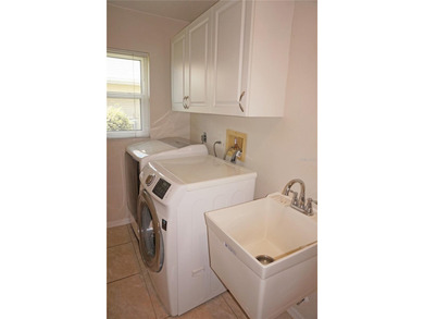 Impressive 3 Bedroom, 2 Bathroom home with attached 2 Car Garage on Deep Creek Golf Club in Florida - for sale on GolfHomes.com, golf home, golf lot