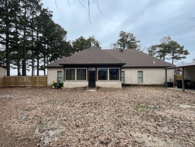 Welcome to Market 783 Club House Drive in Manila. This property on Big Lake Country Club in Arkansas - for sale on GolfHomes.com, golf home, golf lot