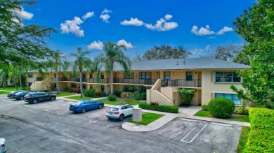 NEWLY RENOVATED, SECOND FLOOR, TWO BEDROOM/TWO BATHROOM CONDO on Delaire Golf and Country Club in Florida - for sale on GolfHomes.com, golf home, golf lot