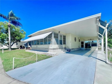 Nestled on a desirable corner lot in the serene back area of the on Fairway Village Golf Course in Florida - for sale on GolfHomes.com, golf home, golf lot