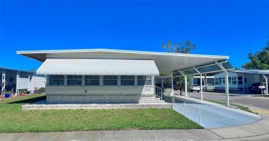 Nestled on a desirable corner lot in the serene back area of the on Fairway Village Golf Course in Florida - for sale on GolfHomes.com, golf home, golf lot