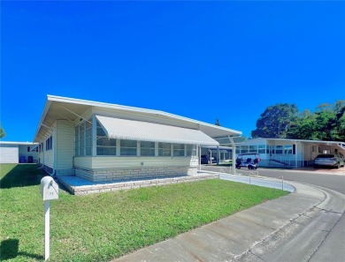 Nestled on a desirable corner lot in the serene back area of the on Fairway Village Golf Course in Florida - for sale on GolfHomes.com, golf home, golf lot