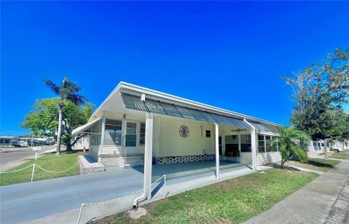 Nestled on a desirable corner lot in the serene back area of the on Fairway Village Golf Course in Florida - for sale on GolfHomes.com, golf home, golf lot