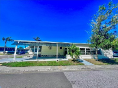 Nestled on a desirable corner lot in the serene back area of the on Fairway Village Golf Course in Florida - for sale on GolfHomes.com, golf home, golf lot