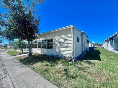 Nestled on a desirable corner lot in the serene back area of the on Fairway Village Golf Course in Florida - for sale on GolfHomes.com, golf home, golf lot
