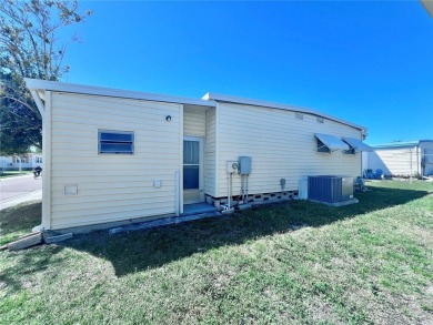 Nestled on a desirable corner lot in the serene back area of the on Fairway Village Golf Course in Florida - for sale on GolfHomes.com, golf home, golf lot