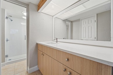 Beautifully updated 1-bedroom, 1.5-bath condo with stunning golf on Cove Cay Country Club in Florida - for sale on GolfHomes.com, golf home, golf lot