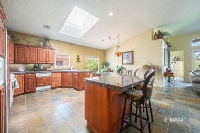 Step into this beautifully furnished Contemporary Southwest on The Oasis Golf Club in Nevada - for sale on GolfHomes.com, golf home, golf lot