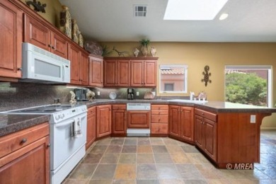 Step into this beautifully furnished Contemporary Southwest on The Oasis Golf Club in Nevada - for sale on GolfHomes.com, golf home, golf lot