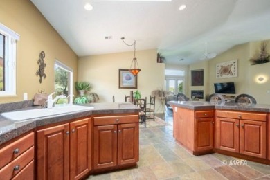 Step into this beautifully furnished Contemporary Southwest on The Oasis Golf Club in Nevada - for sale on GolfHomes.com, golf home, golf lot