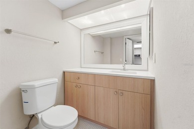 Beautifully updated 1-bedroom, 1.5-bath condo with stunning golf on Cove Cay Country Club in Florida - for sale on GolfHomes.com, golf home, golf lot