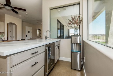 Located at 6322 S Via De Oro, Fort Mohave, Arizona, this on Los Lagos Golf Club in Arizona - for sale on GolfHomes.com, golf home, golf lot