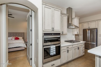 Located at 6322 S Via De Oro, Fort Mohave, Arizona, this on Los Lagos Golf Club in Arizona - for sale on GolfHomes.com, golf home, golf lot