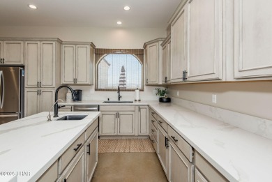 Located at 6322 S Via De Oro, Fort Mohave, Arizona, this on Los Lagos Golf Club in Arizona - for sale on GolfHomes.com, golf home, golf lot