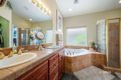 Step into this beautifully furnished Contemporary Southwest on The Oasis Golf Club in Nevada - for sale on GolfHomes.com, golf home, golf lot