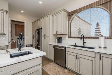 Located at 6322 S Via De Oro, Fort Mohave, Arizona, this on Los Lagos Golf Club in Arizona - for sale on GolfHomes.com, golf home, golf lot