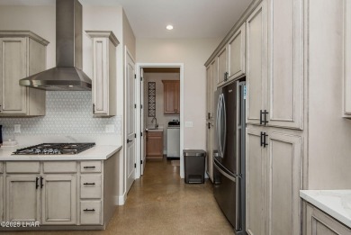 Located at 6322 S Via De Oro, Fort Mohave, Arizona, this on Los Lagos Golf Club in Arizona - for sale on GolfHomes.com, golf home, golf lot