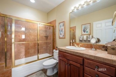 Step into this beautifully furnished Contemporary Southwest on The Oasis Golf Club in Nevada - for sale on GolfHomes.com, golf home, golf lot