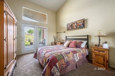 Step into this beautifully furnished Contemporary Southwest on The Oasis Golf Club in Nevada - for sale on GolfHomes.com, golf home, golf lot