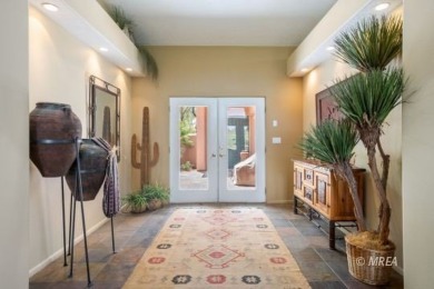 Step into this beautifully furnished Contemporary Southwest on The Oasis Golf Club in Nevada - for sale on GolfHomes.com, golf home, golf lot