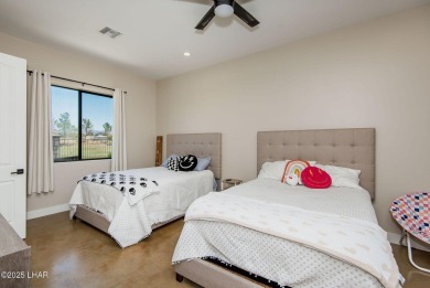 Located at 6322 S Via De Oro, Fort Mohave, Arizona, this on Los Lagos Golf Club in Arizona - for sale on GolfHomes.com, golf home, golf lot