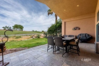 Step into this beautifully furnished Contemporary Southwest on The Oasis Golf Club in Nevada - for sale on GolfHomes.com, golf home, golf lot