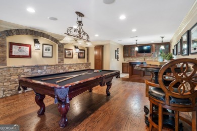 Experience luxury living at its finest in this stunning on Alpharetta Athletic Club East in Georgia - for sale on GolfHomes.com, golf home, golf lot