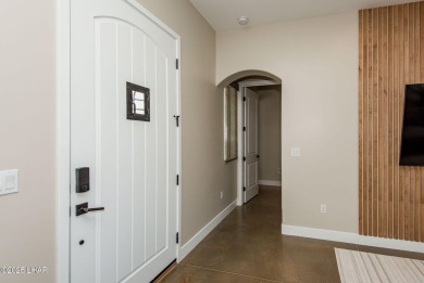 Located at 6322 S Via De Oro, Fort Mohave, Arizona, this on Los Lagos Golf Club in Arizona - for sale on GolfHomes.com, golf home, golf lot