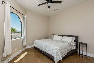 Located at 6322 S Via De Oro, Fort Mohave, Arizona, this on Los Lagos Golf Club in Arizona - for sale on GolfHomes.com, golf home, golf lot