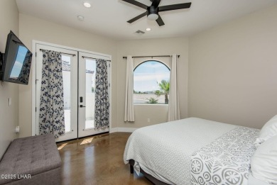 Located at 6322 S Via De Oro, Fort Mohave, Arizona, this on Los Lagos Golf Club in Arizona - for sale on GolfHomes.com, golf home, golf lot