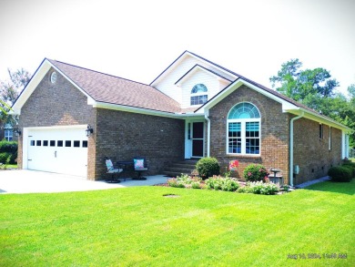 This immaculate home built by Bobby Carter Construction is easy on Players Course At Wyboo Plantation in South Carolina - for sale on GolfHomes.com, golf home, golf lot