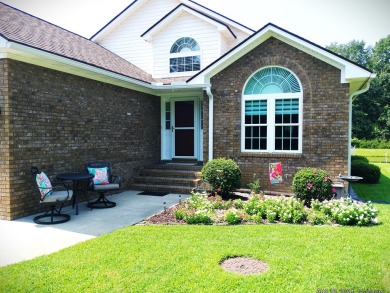 This immaculate home built by Bobby Carter Construction is easy on Players Course At Wyboo Plantation in South Carolina - for sale on GolfHomes.com, golf home, golf lot