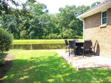 This immaculate home built by Bobby Carter Construction is easy on Players Course At Wyboo Plantation in South Carolina - for sale on GolfHomes.com, golf home, golf lot