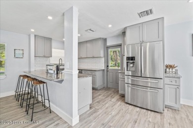 Welcome to this remodeled 4 BEDROOM, 2 BATH one-story home in on Crane Creek Reserve Golf Club in Florida - for sale on GolfHomes.com, golf home, golf lot
