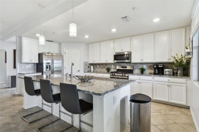 This beautiful end-unit Coach home offers breathtaking views of on Lakewood National Golf Club in Florida - for sale on GolfHomes.com, golf home, golf lot