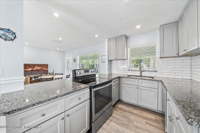 Welcome to this remodeled 4 BEDROOM, 2 BATH one-story home in on Crane Creek Reserve Golf Club in Florida - for sale on GolfHomes.com, golf home, golf lot