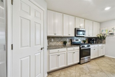 This beautiful end-unit Coach home offers breathtaking views of on Lakewood National Golf Club in Florida - for sale on GolfHomes.com, golf home, golf lot