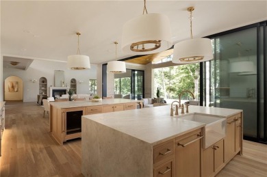 Perched atop a commanding hilltop setting in Atlanta Country on Atlanta Country Club in Georgia - for sale on GolfHomes.com, golf home, golf lot