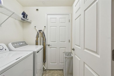 This beautiful end-unit Coach home offers breathtaking views of on Lakewood National Golf Club in Florida - for sale on GolfHomes.com, golf home, golf lot