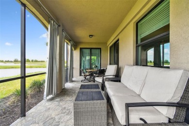 This beautiful end-unit Coach home offers breathtaking views of on Lakewood National Golf Club in Florida - for sale on GolfHomes.com, golf home, golf lot