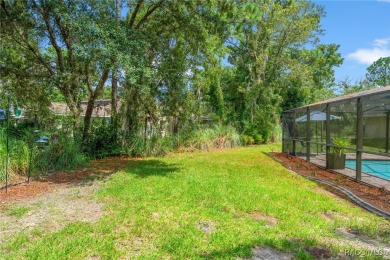 This exquisite 3-bedroom, 2-bathroom home, spanning 2,109 square on Sugarmill Woods Golf and Country Club in Florida - for sale on GolfHomes.com, golf home, golf lot