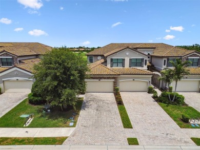 This beautiful end-unit Coach home offers breathtaking views of on Lakewood National Golf Club in Florida - for sale on GolfHomes.com, golf home, golf lot