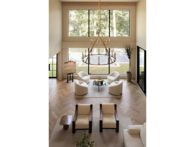 Perched atop a commanding hilltop setting in Atlanta Country on Atlanta Country Club in Georgia - for sale on GolfHomes.com, golf home, golf lot