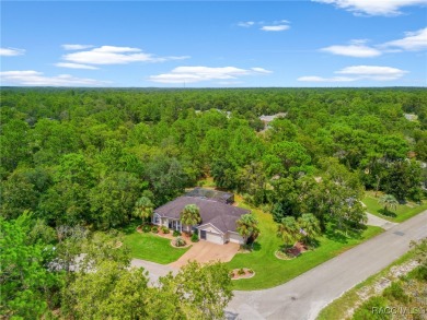 This exquisite 3-bedroom, 2-bathroom home, spanning 2,109 square on Sugarmill Woods Golf and Country Club in Florida - for sale on GolfHomes.com, golf home, golf lot