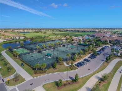 This beautiful end-unit Coach home offers breathtaking views of on Lakewood National Golf Club in Florida - for sale on GolfHomes.com, golf home, golf lot